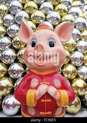 Un felice celebrazione dell Anno del maiale. Foto Stock