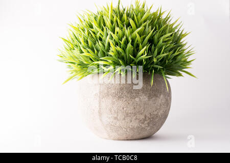 Round erba pianta in vaso pianta artificiale casa decor Foto Stock
