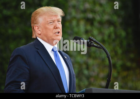 Colleville Sur Mer, Francia. Il 6 giugno, 2019. Stati Uniti Presidente Donald Trump risolve una cerimonia di commemorazione che segna il settantacinquesimo D-Giorno Anniversario in Normandia Cimitero e memoriale americano a Giugno 6, 2019 in Colleville-sur-Mer, Francia. Migliaia di persone sono confluite in Normandia per commemorare il settantacinquesimo anniversario della Operazione Overlord, la seconda guerra mondiale invasione Alleata comunemente noto come D-Day. Credito: Planetpix/Alamy Live News Foto Stock