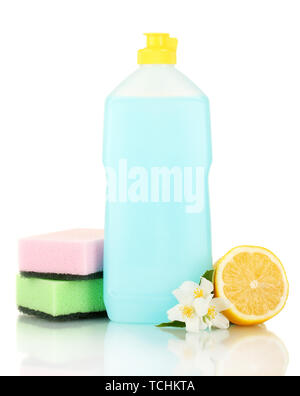 Detersivo liquido per stoviglie con spugne e limone con fiori su sfondo blu Foto Stock