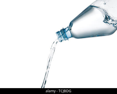 mineral water pouring from plastic bottle Foto Stock