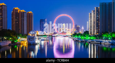 Vista notturna dell'Occhio di Tianjin, Cina Foto Stock