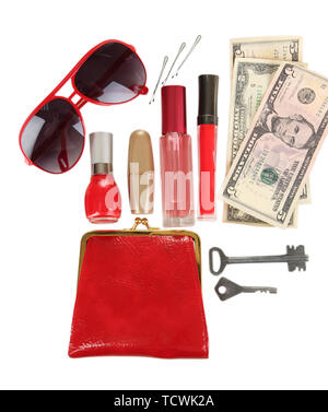 Gli elementi contenuti nella donna borsetta isolato su bianco Foto Stock