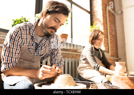 Ceramisti al lavoro Foto Stock