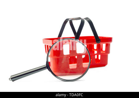 Rosso di Shopping Cart e lente di ingrandimento Foto Stock