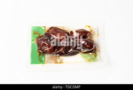 Arabo date in piccoli package per il Ramadan close up Foto Stock