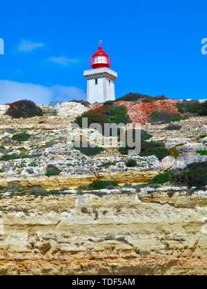 Faro di Lagos, Ponte da Piedade a costa di Algarve in Portogallo Foto Stock