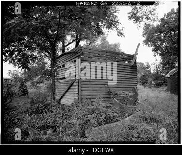 Nord-est posteriore e lato nord ovest - Benjamin Holmes Farm, Smokehouse 1458 Sanguinello Road, Snellville, Gwinnett County, GA Foto Stock