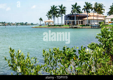 Napoli Florida,Napoli Bay Water Haldeman Creek Water,Port Royal,Golfo del Messico,Waterfront Mansion,dock,visitatori viaggio viaggio turismo turistico Foto Stock