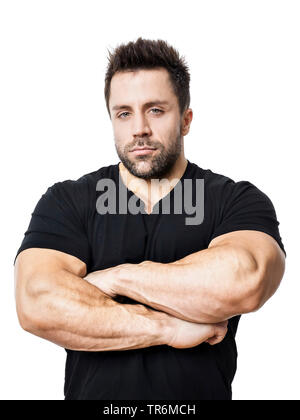 Giovane uomo muscolare in t-shirt, Germania Foto Stock