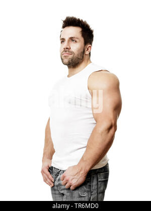 Giovane uomo muscolare in maglietta tmuscle, Germania Foto Stock