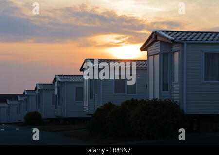 Bel tramonto su un parco vacanze Foto Stock