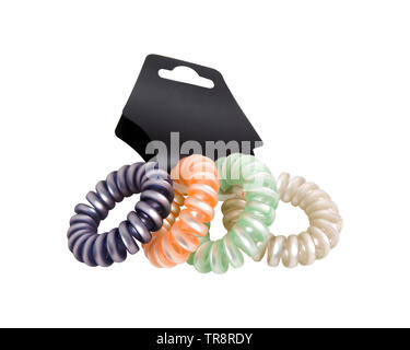 Capelli colorati Band isolato su sfondo bianco con percorso di clipping. Primo piano della spirale colorata di quattro bande di gomma per accessori di moda. Bella Foto Stock