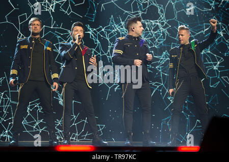 Glasgow, Regno Unito. 28 maggio 2019. Conosciuta in tutto il mondo boy band, Westlife, in concerto a Idro Arena di Glasgow durante la 'venti Tour'. Nella foto: (sinistra-destra) Kian Egan; Shane Filan; Markus Mark; Nicky Byrne. Foto Stock