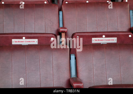 Sir Bobby Charlton's posti vuoti nella casella di amministratori a Old Trafford, Manchester United Football Club, Manchester, Lancashire, Inghilterra, Regno Unito. Foto Stock