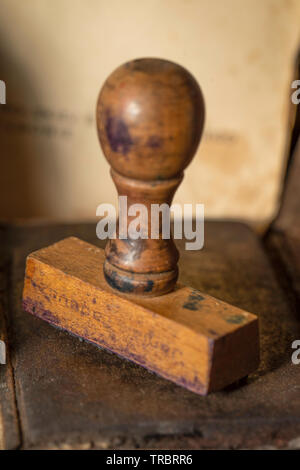 Vintage francobollo di legno - standard per le apparecchiature per ufficio. Foto Stock