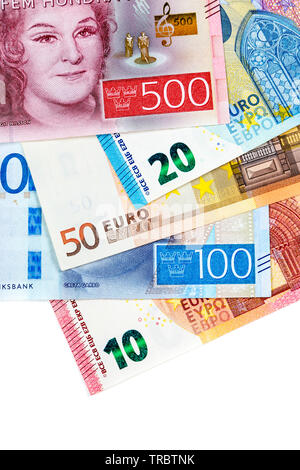 Mix di sparse Swedish krona note e di Euro sullo sfondo Foto Stock