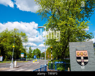 Il logo, la protezione dell'Università di Reading, Whiteknights Campus, Reading, Berkshire, Inghilterra, Regno Unito, GB. Foto Stock