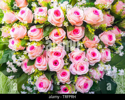 Mazzo di fiori Rose in un brides / mazzetto di fiori rosa Foto Stock