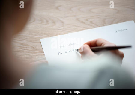 Scrivere la lettera ad un amico Foto Stock