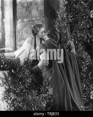 ERROL FLYNN e Olivia de Havilland in LE AVVENTURE DI ROBIN HOOD 1938 registi Michael Curtiz e William Keighley Warner Bros Foto Stock