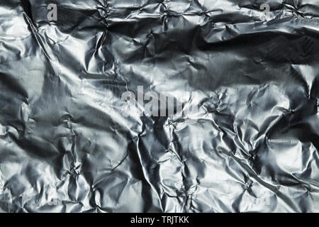 Texture di sfondo accartocciata di lamina di alluminio Foto Stock