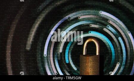 Il lucchetto chiuso. lucchetto posto nella parte anteriore di una sfocatura circolare bokeh luce. computer digitale e tema internet i concetti di sicurezza. cyber security e vir Foto Stock