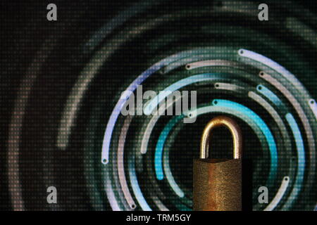 Il lucchetto chiuso. lucchetto posto nella parte anteriore di una sfocatura circolare bokeh luce. computer digitale e tema internet i concetti di sicurezza. cyber security e vir Foto Stock