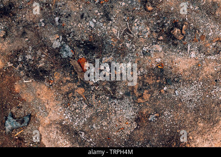 Ruvido grunge texture di superficie con rocce e il vetro rotto Foto Stock