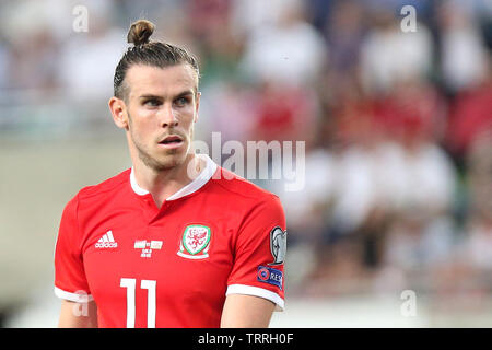 Budapest, Ungheria. 11 Giugno, 2019. Gareth Bale del Galles guarda a. Ungheria v Galles, UEFA EURO 2020 il qualificatore, gruppo e corrispondono al Groupama Arena di Budapest, Ungheria martedì 11 giugno 2019. Questa immagine può essere utilizzata solo per scopi editoriali. Solo uso editoriale, pic da Gareth John/Andrew Orchard fotografia sportiva/Alamy Live news Credito: Andrew Orchard fotografia sportiva/Alamy Live News Foto Stock