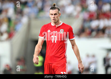 Budapest, Ungheria. 11 Giugno, 2019. Gareth Bale del Galles guarda a. Ungheria v Galles, UEFA EURO 2020 il qualificatore, gruppo e corrispondono al Groupama Arena di Budapest, Ungheria martedì 11 giugno 2019. Questa immagine può essere utilizzata solo per scopi editoriali. Solo uso editoriale, pic da Gareth John/Andrew Orchard fotografia sportiva/Alamy Live news Credito: Andrew Orchard fotografia sportiva/Alamy Live News Foto Stock