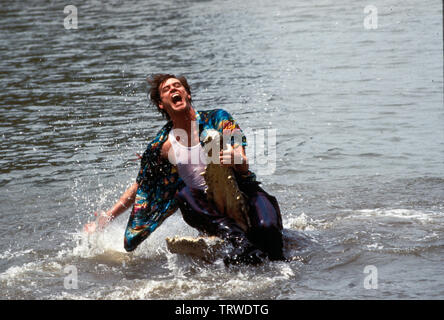 JIM CARREY in Ace Ventura: quando la natura chiamate (1995). Copyright: solo uso editoriale. No merchandising o copertine di libri. Questa è una distribuita pubblicamente handout. I diritti di accesso soltanto, senza licenza di copyright fornite. Solo per essere riprodotto in concomitanza con la promozione di questo film. Credito: MORGAN CREEK / Album Foto Stock