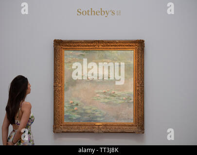 Sotheby's, Londra, Regno Unito. 14 giugno 2019. Impressionismo principali ai moderni stabilimenti Inglesi, alcuni invisibile per decenni sono visualizzati in anteprima per la Sotheby's estate vendita. Immagine: Claude Monet. Nymphéas, 1908 (Waterlilies). Stima £25m-35m. Credito: Malcolm Park/Alamy Live News. Foto Stock