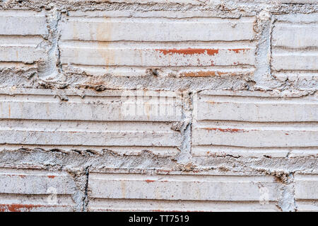 Un muro di mattoni, parete dipinta, bianco Foto Stock