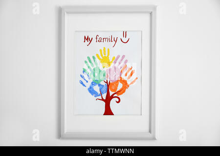 Famiglia stampe a mano in cornice alla parete Foto Stock