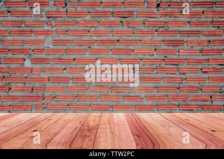 In mattoni marroni di pareti e pavimenti in legno per lo sfondo del prodotto Foto Stock