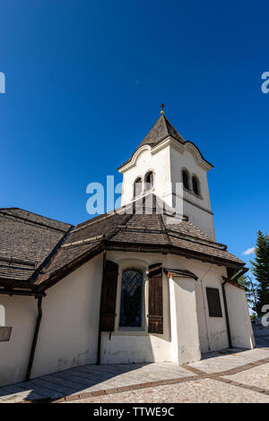 Antico Santuario di Monte Santo di Lussari, luogo di pellegrinaggio nelle Alpi italiane. Provincia di Udine, Friuli Venezia Giulia, Italia, Europa Foto Stock