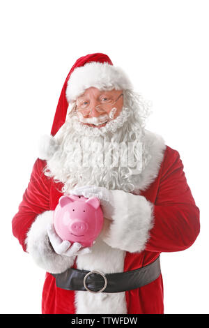 Santa Claus holding salvadanaio su sfondo bianco Foto Stock