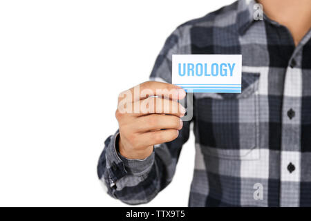 Uomo con business card. Concetto di urologia Foto Stock