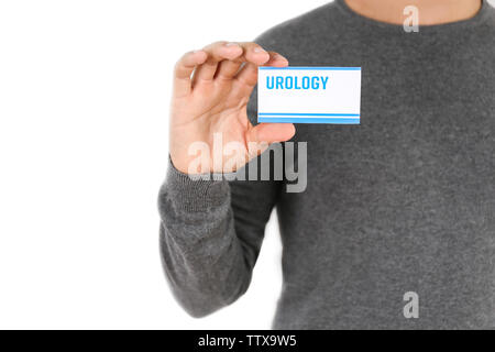 Uomo con business card. Concetto di urologia Foto Stock