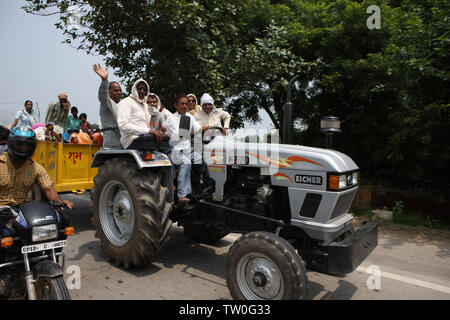 Tractor on the road, New Delhi, India Stock Photo