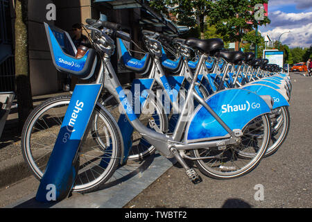 Shaw andare in bici programma di condivisione. Mobibikes Foto Stock