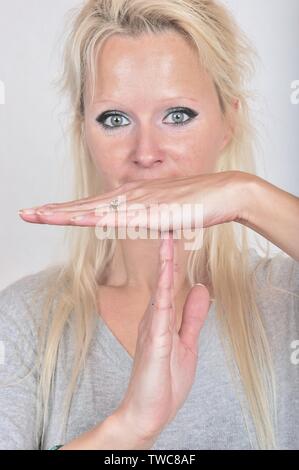 Tempo di pausa gesto a mano Foto Stock