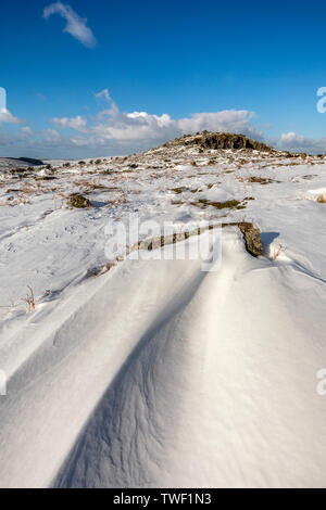 Cheesewring; nella neve; Cornovaglia; Regno Unito Foto Stock