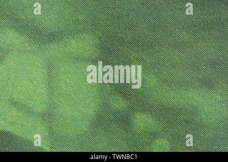 Immagine macro di gradiente verde CMYK per punti sulla carta da giornale Foto Stock