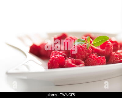Tazza di lamponi freschi dessert artigianali Foto Stock