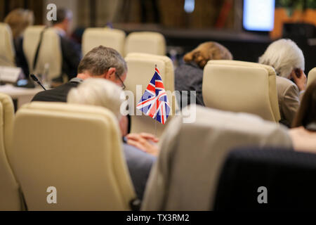 Dettagli con la bandiera del Regno Unito nel corso di una conferenza dei funzionari dell' Unione europea Foto Stock