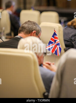 Dettagli con la bandiera del Regno Unito nel corso di una conferenza dei funzionari dell' Unione europea Foto Stock