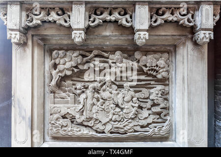 Il fiore pensile Fulushou Xi scultura in pietra parete parete nella città antica di Pingyao, nella provincia di Shanxi. Foto Stock