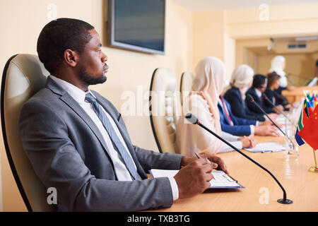 Certi giovani afro-americani in delegato convenzionale Foto Stock
